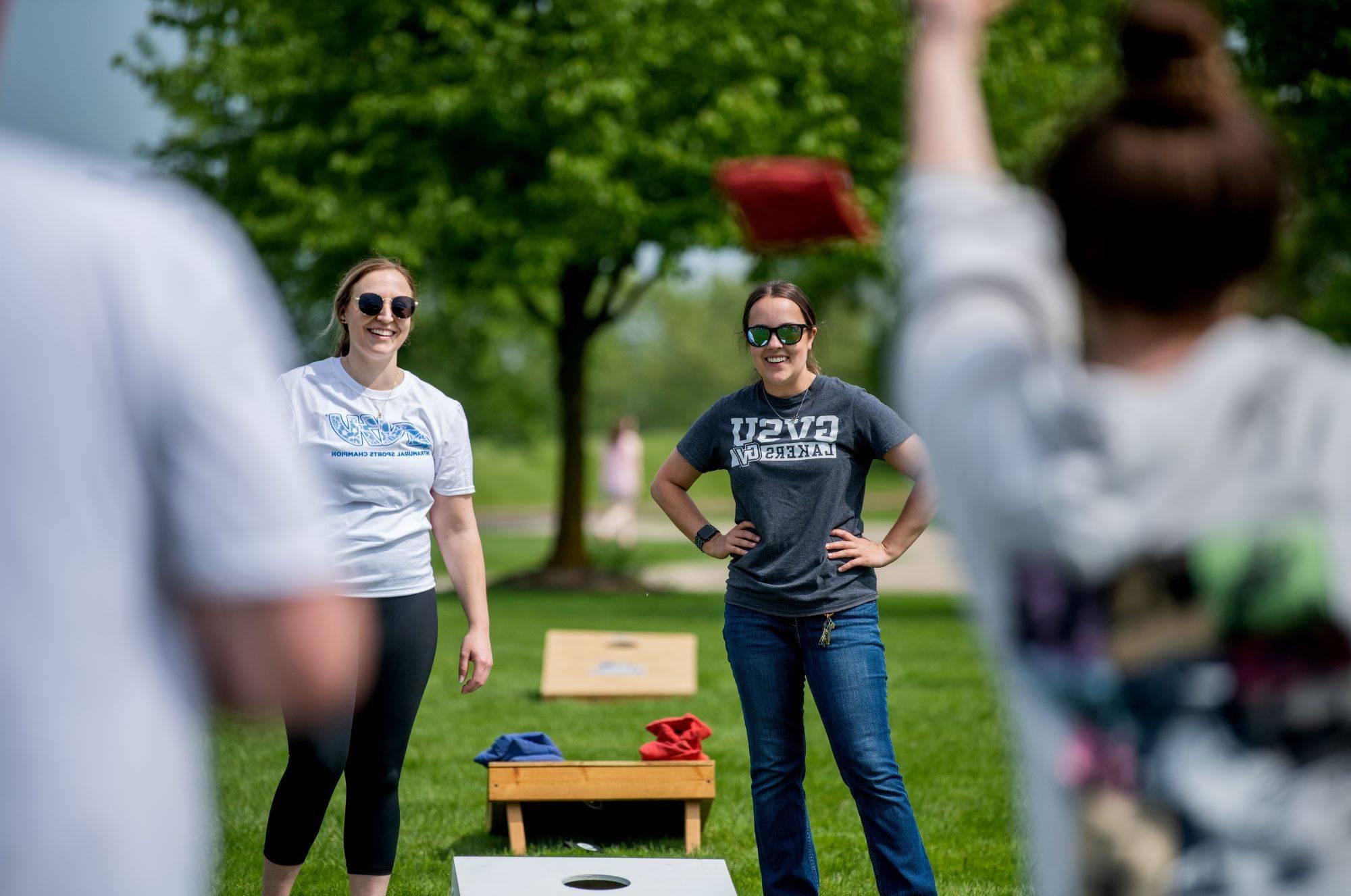 Participants play during the 4th GVSU Cornhole Tournament